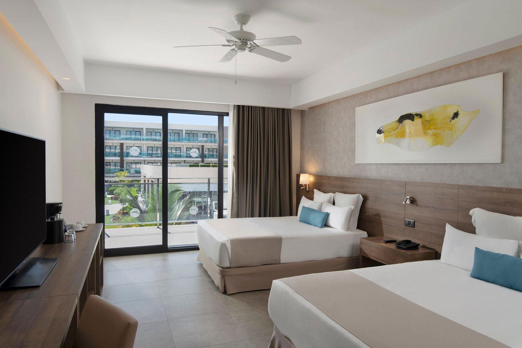 tour-gallery-https://ttand.imgix.net/puj-serenade-punta-cana-room-lxry-trop-gv-01jpg-1748139760427.jpg